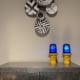 Two blue taxiway lights on a cabinet. For sale.