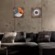 Two steel roundels in a living room.