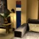 Blue Mil Mi-8 helicopter rotor next to a couch.