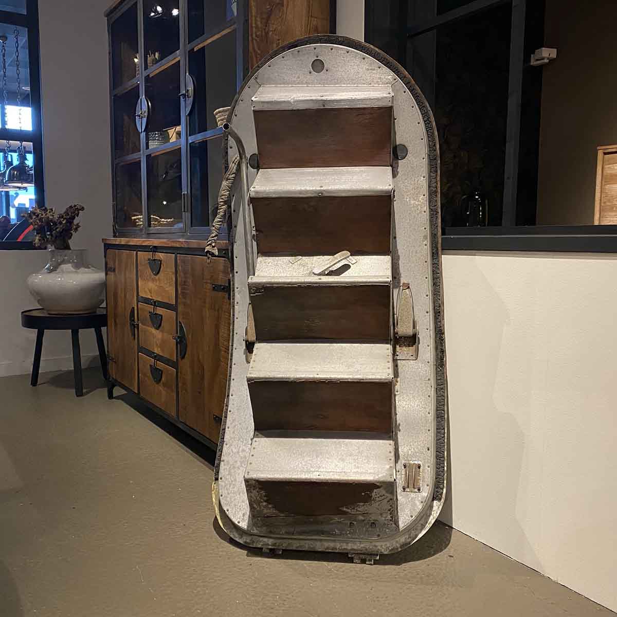 Original DC-3 / C-47 passenger door with steps inside a living room.