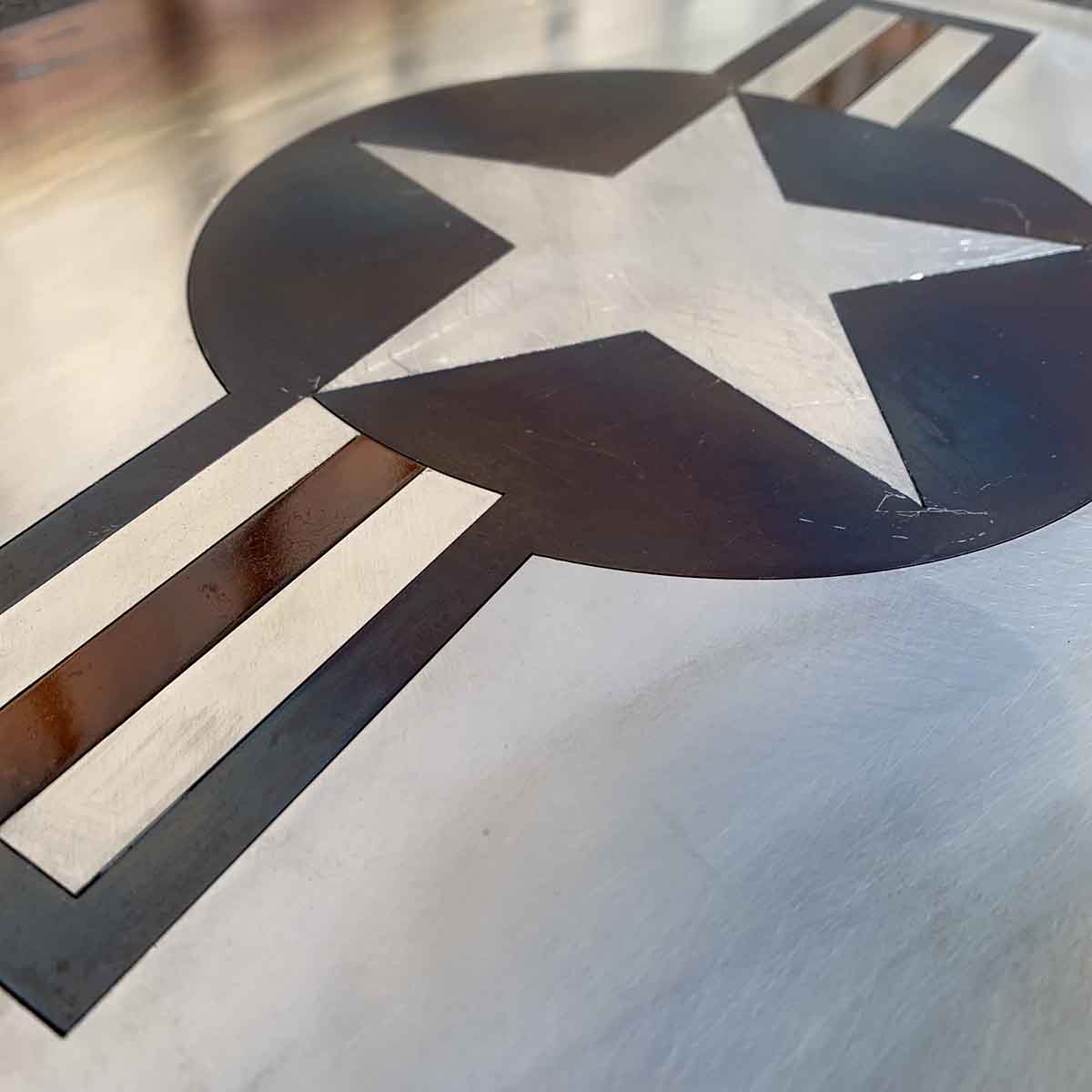 Detail of a United States Air Force steel roundel artwork.