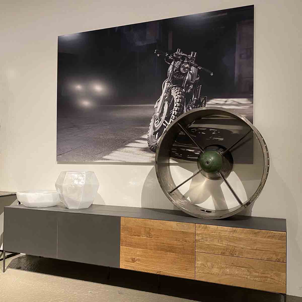 Front body of Klimov RD-33 jet engine as a decorative item in a living room.