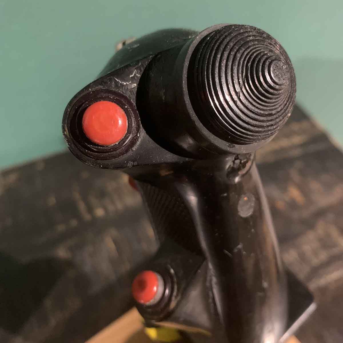 Detail of 4-way switch on original Belgian Air Force B-8 control stick grip.