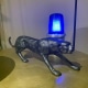 Stripped taxiway light with a decorative panther.