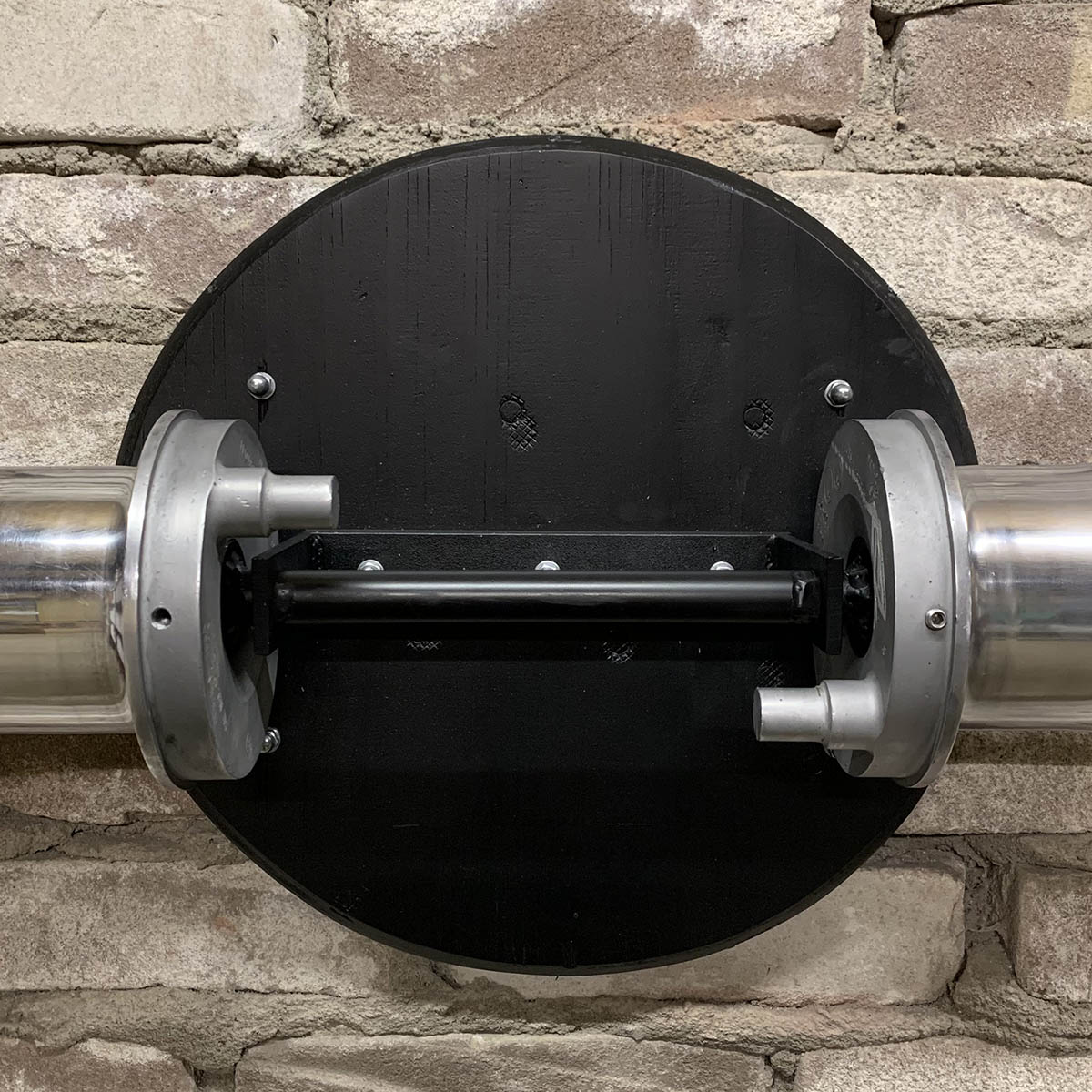 Detail of wall mounting bracket of mirror polished Hartzell propeller and spinner.