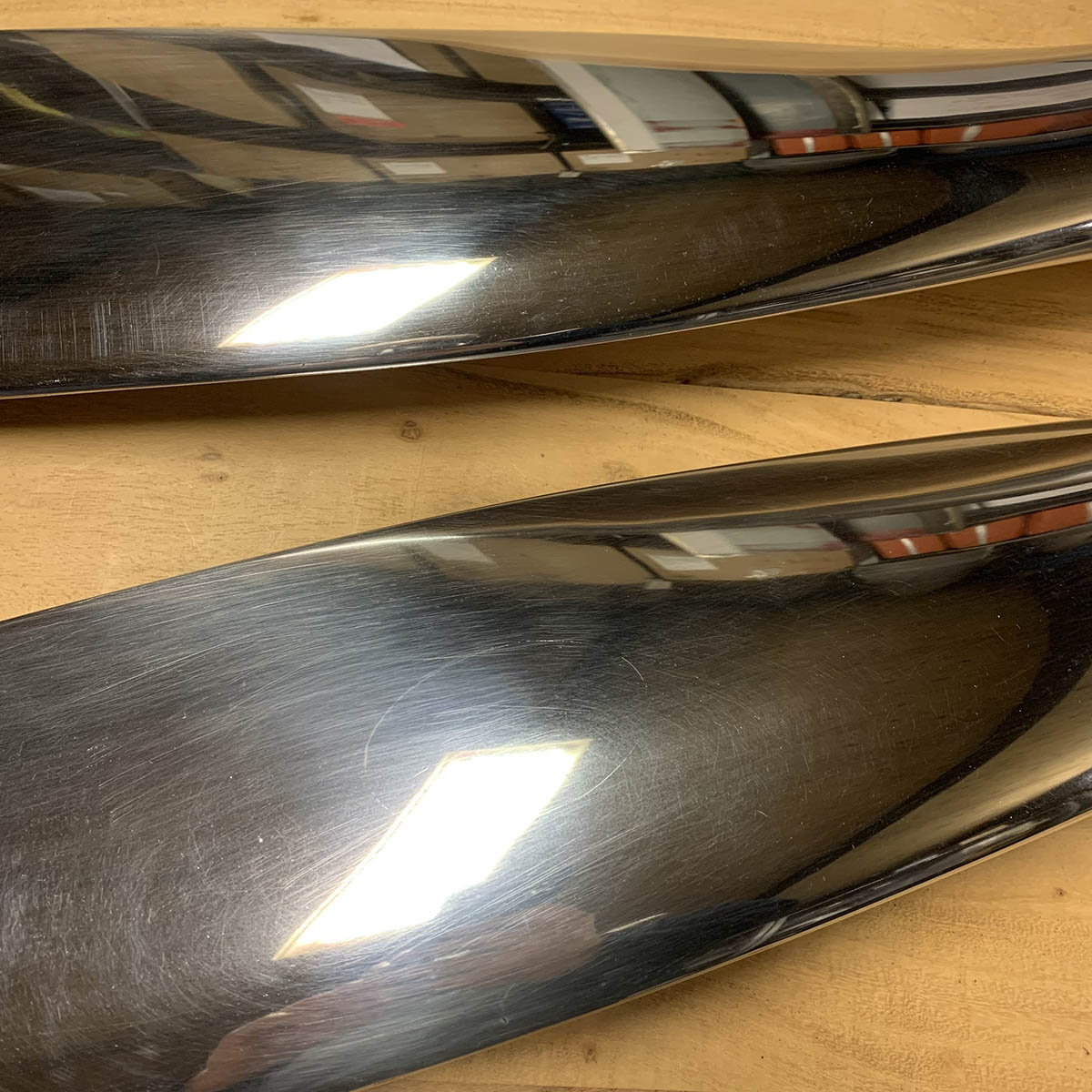 Detail of propeller blade on mirror polished Hartzell propeller and spinner for sale.