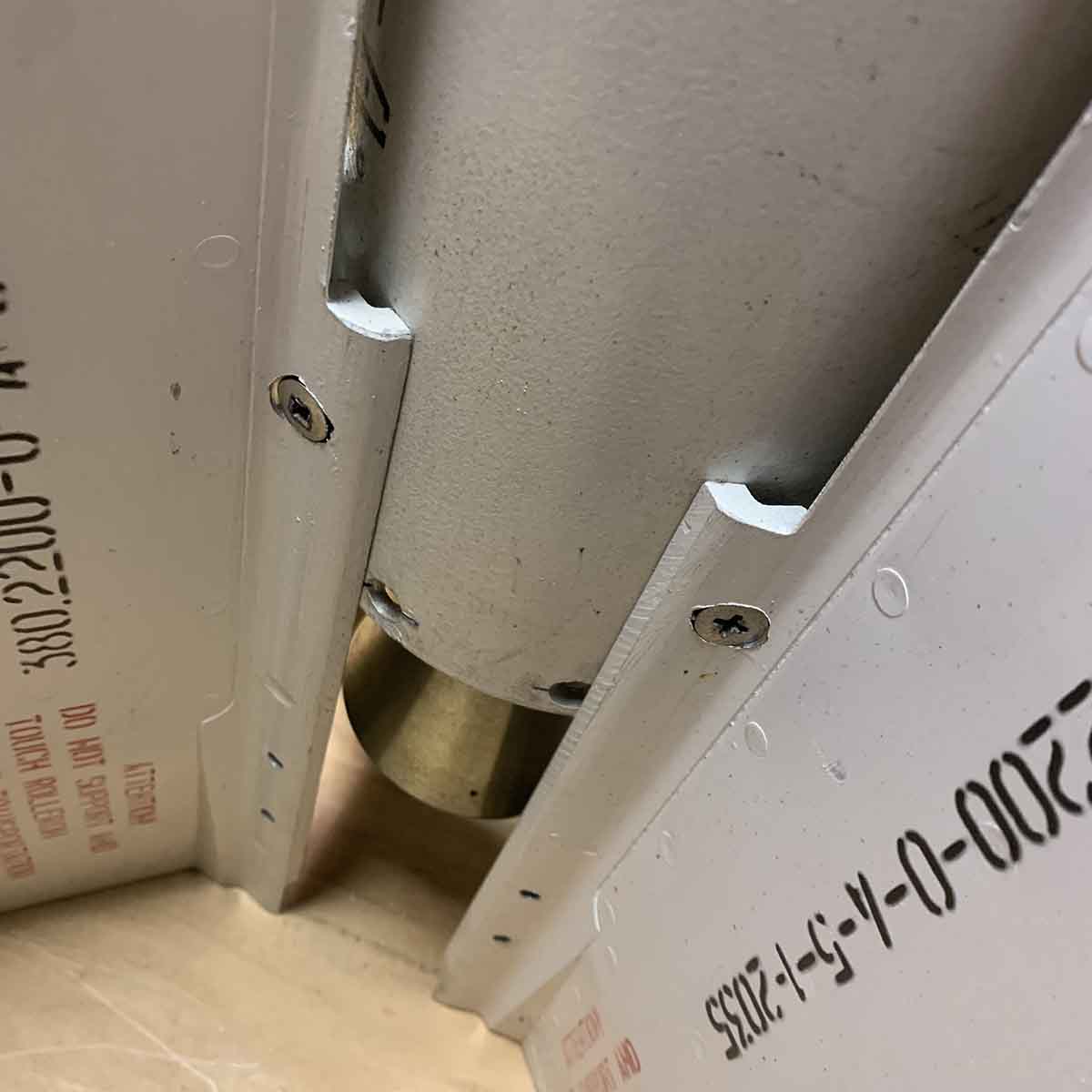 Detail of fins of a Vympel K-13 missile in use as a decorative piece.