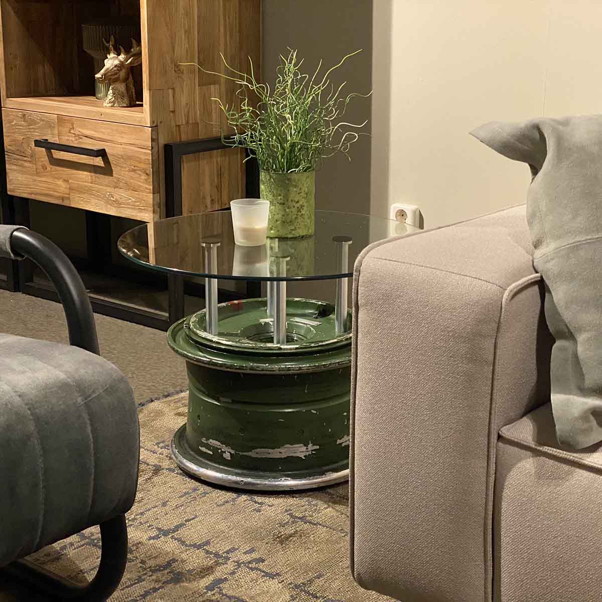 Side table made of main landing wheel of a MiG-29 Fulcrum in a living room.