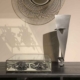 CFM56-3 engine fan blade on a cabinet as a decorative piece.