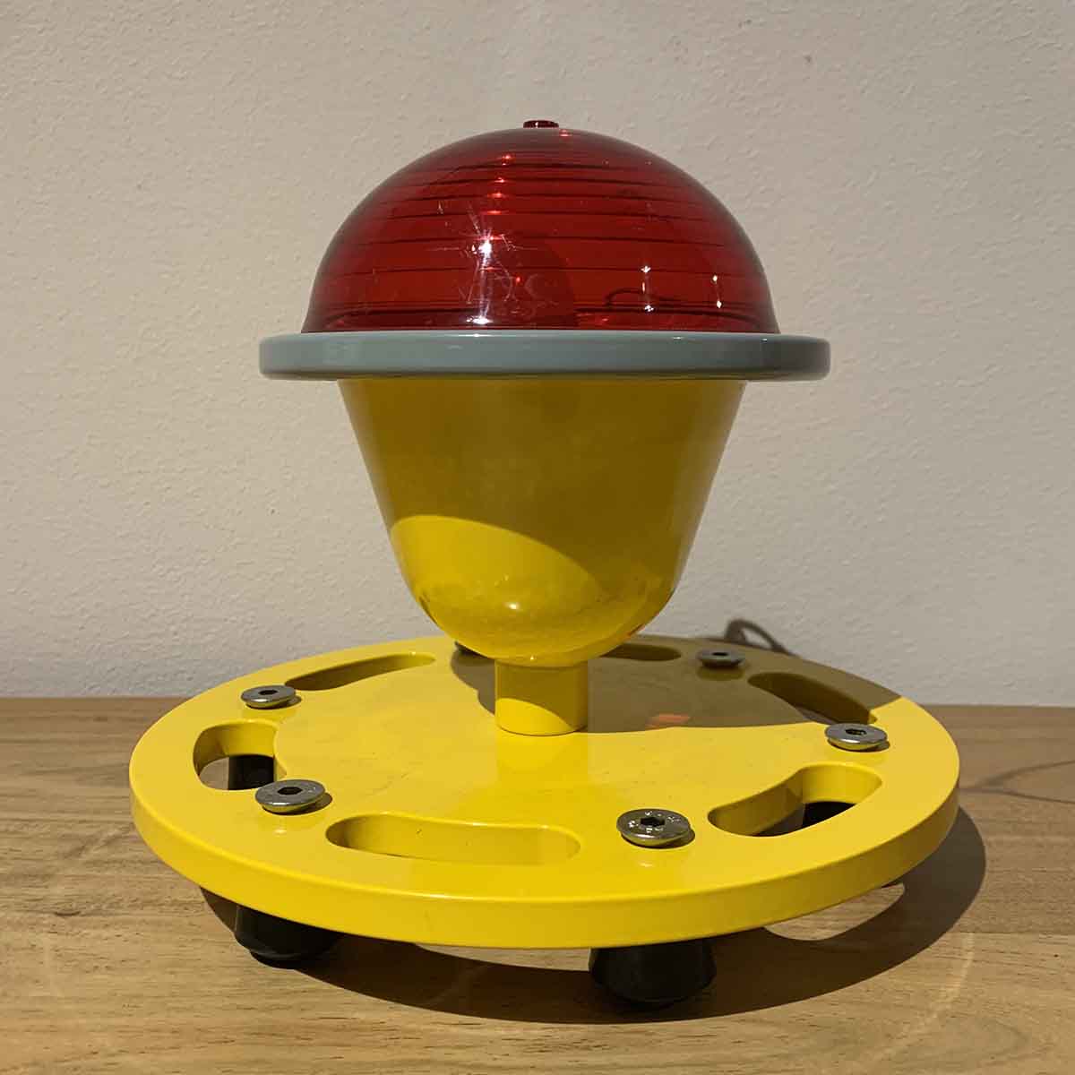 Refurbished World War II runway obstruction light unlit.