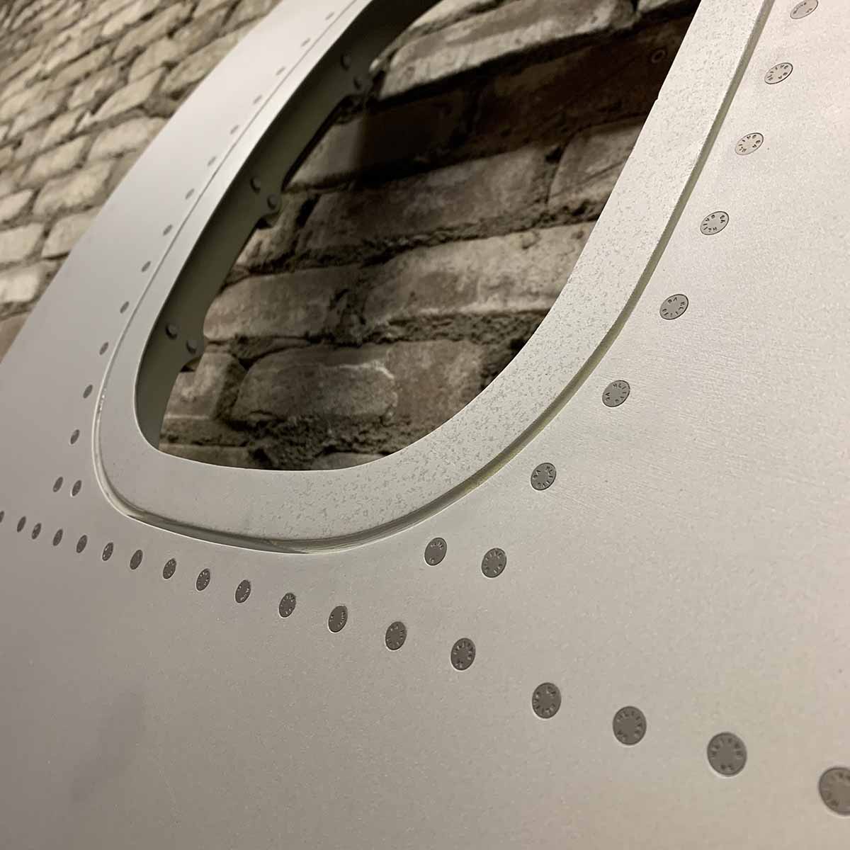Detail of a pearl blasted ATR42 window.
