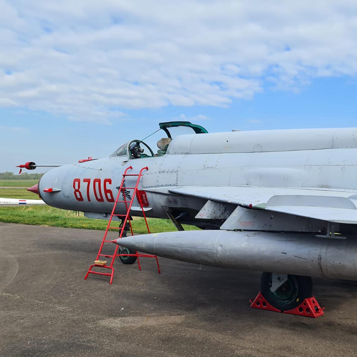Former Polish Air Force MiG-21MF 8706 with all covers and ladder.