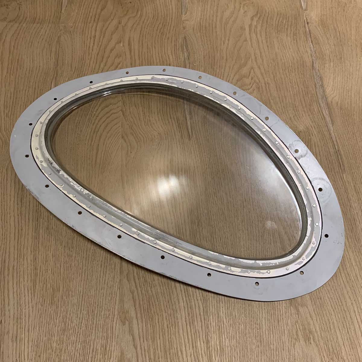 Back side of an Air France Airbus A340 landing light lens for sale.