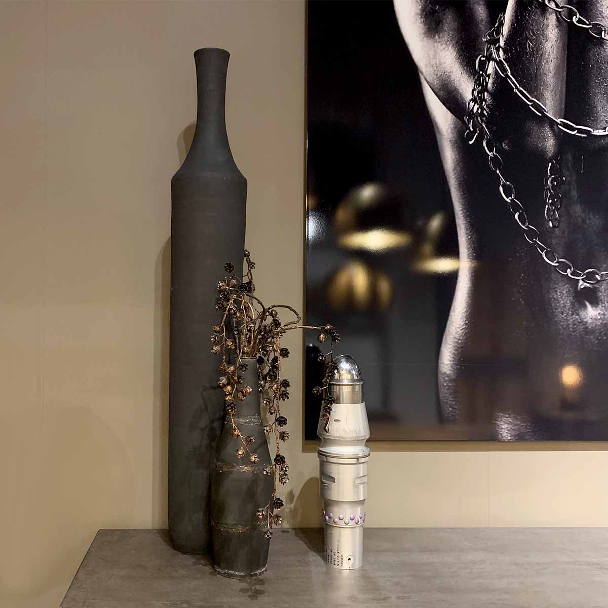 Panavia Tornado in-flight refueling nozzle next to two large vases.