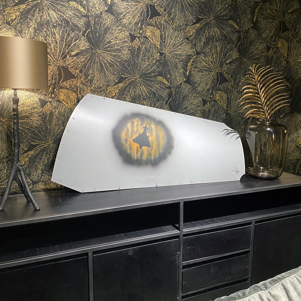 Original Eurofighter Typhoon skin panel airbrushed with Typhoon art as a decorative piece on a cabinet.