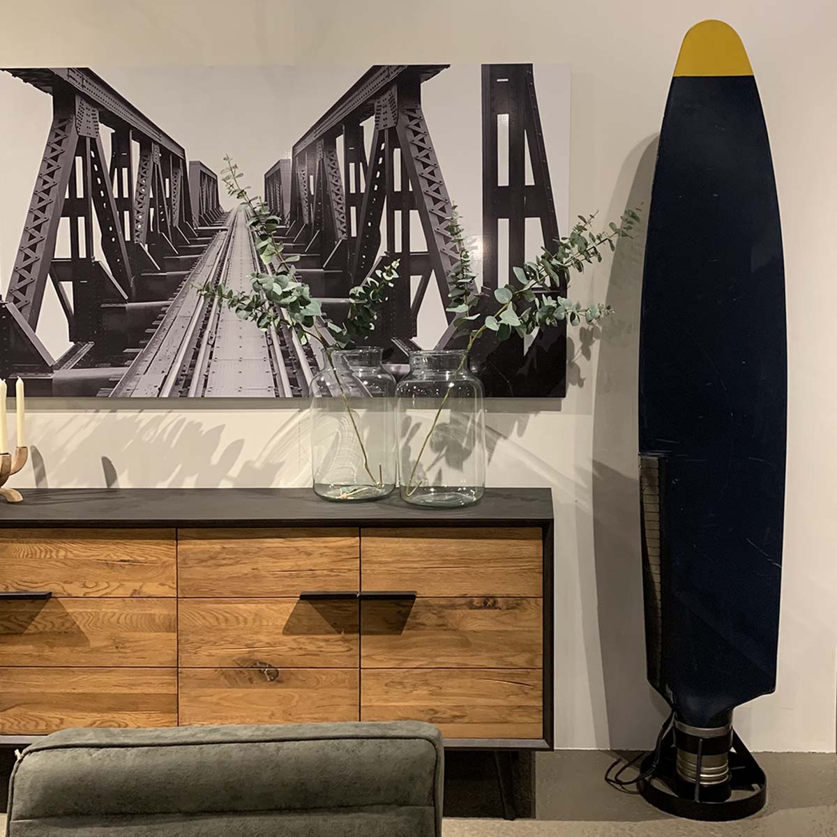 Antonov 24 propeller in use as a decorative piece next to a cabinet in a living room.