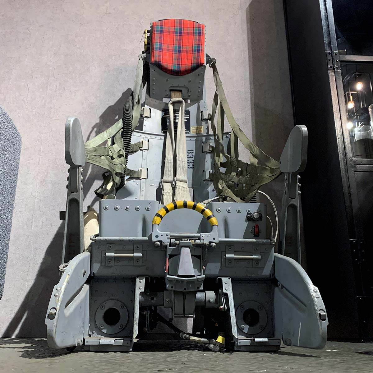 Lockheed C2 ejection seat, for the F-104 Starfighter, in use as a decorative piece in a living room.