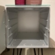 Inside of an upcycled Atlas norm aircraft galley container side table.