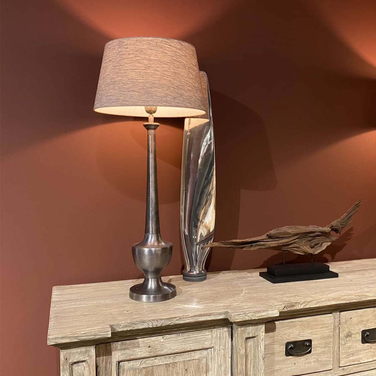 Hartzell propeller, polished for use as a decorative piece, in a living room.