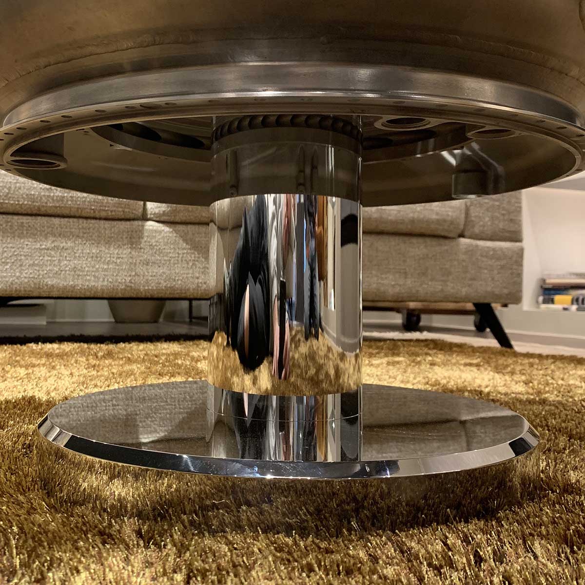 View of the stand of a table made of the gas generator case of a Pratt & Whitney Canada PW100.