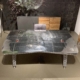 Office desk made from two mirror polished Twin Beech aircraft wingtips.