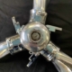 Top view of a three-bladed Hartzell propeller and hub that was chrome-plated and prepared for display purposes.