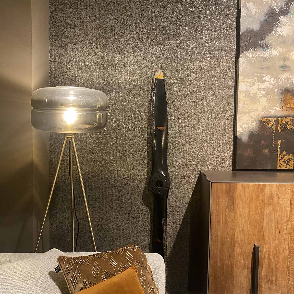 Wooden propeller, for a Jodel aircraft, produced by G. Merville in France standing in a living room.