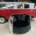 Douglas C-47 Dakota engine cowling love seat in front of a red Volkswagen Transporter T1 van.
