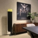 Black and yellow painted tail rotor blade of a Mi-8 Hip helicopter in use as a decorative piece in a modern living room.