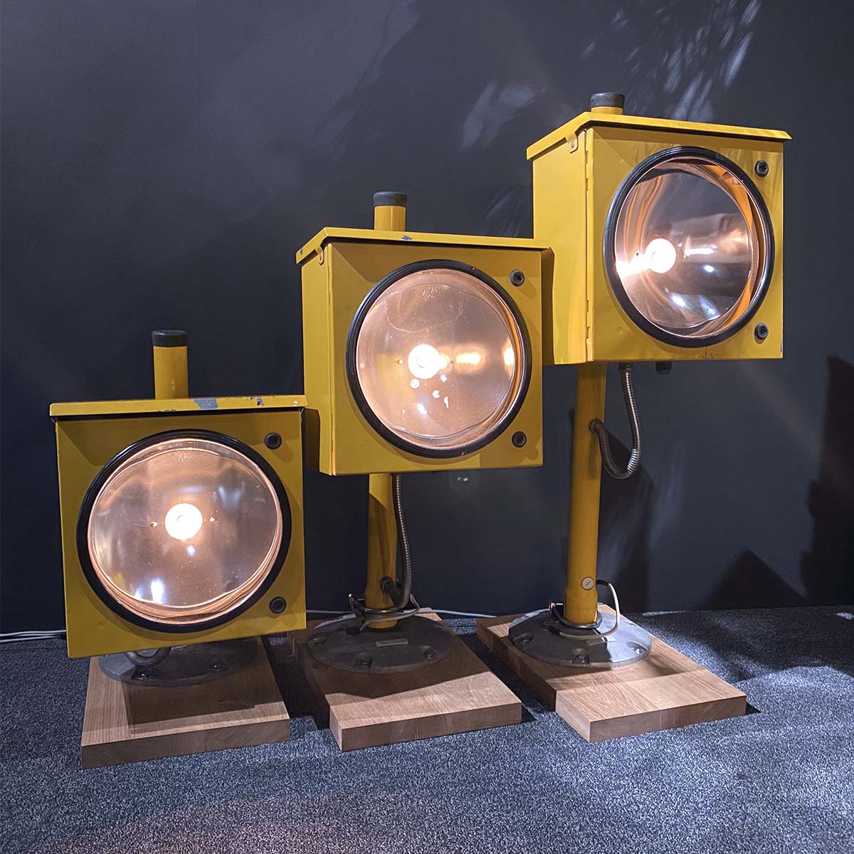 Three approach sequence flash lights (type Honeywell ASL-40) installed on oak bases as interior lights for sale.