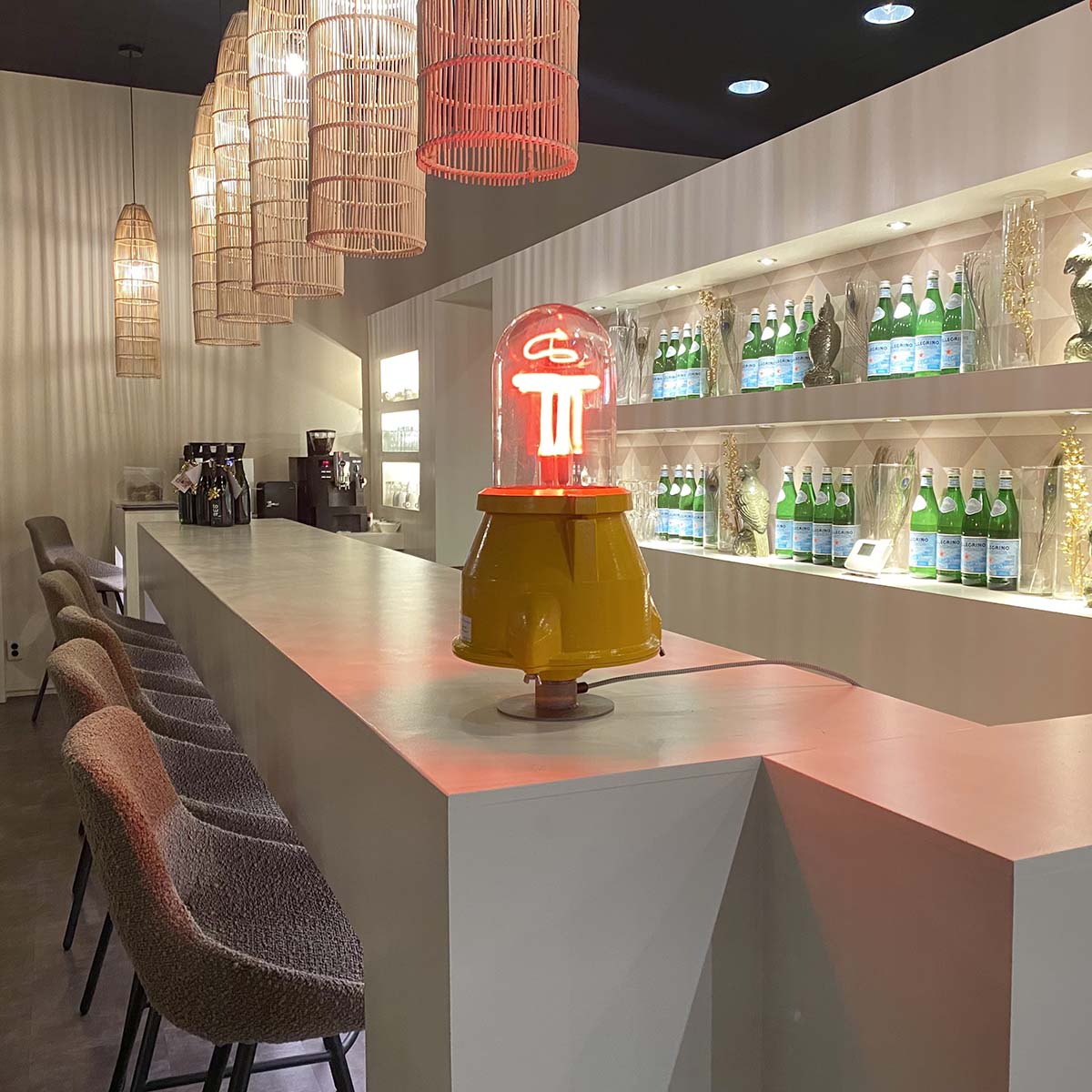Refurbished AEG Berlin airport obstruction light in use as a light in a light and modern bar.