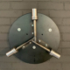Custom made wall mounting bracket to hold a three-bladed Hartzell propeller and spinner.