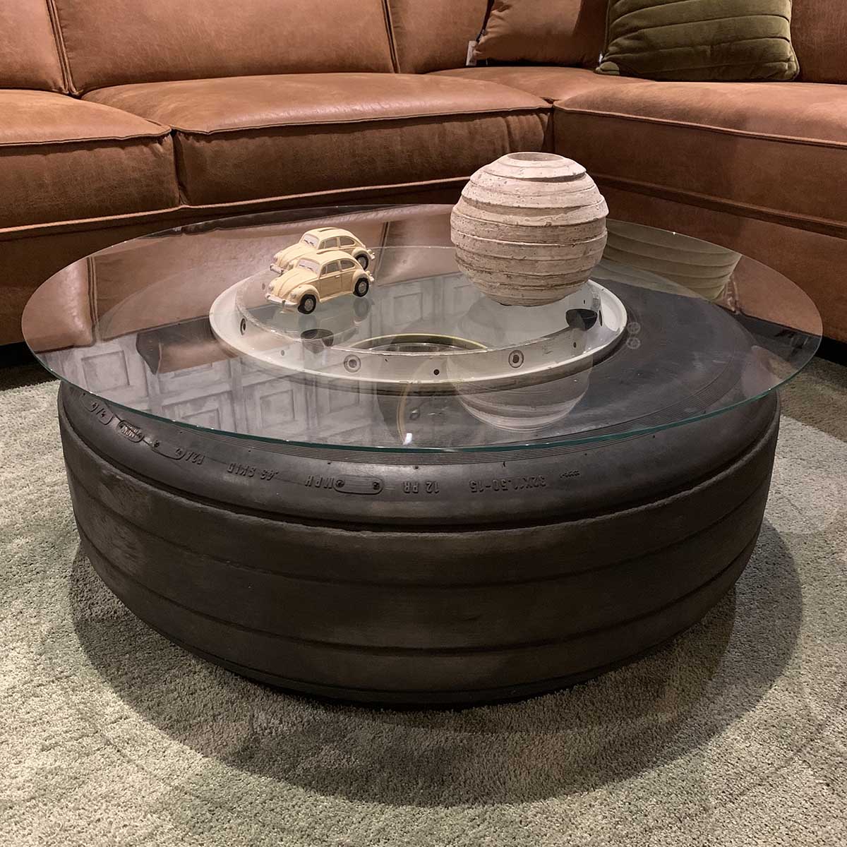 Boeing 727 nosewheel in use as a coffee table in a living room.