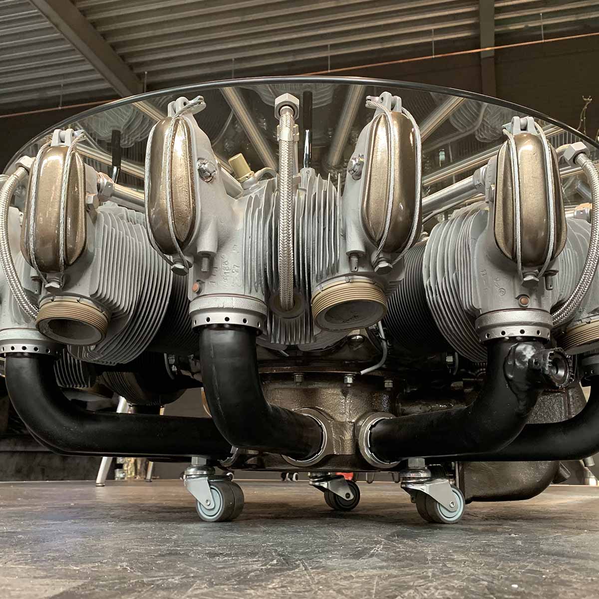 Underside view of a Vedeneyev M14V helicopter engine turned into a table.
