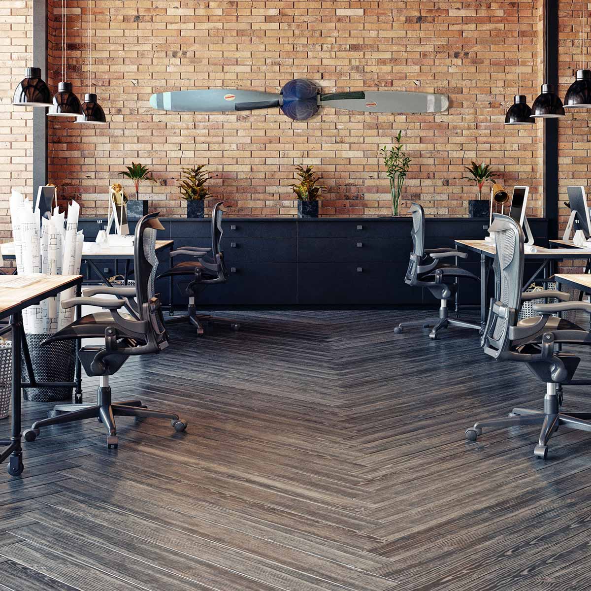 Two-bladed Hartzell propeller in original colours, wall-mounted in a modern office environment.