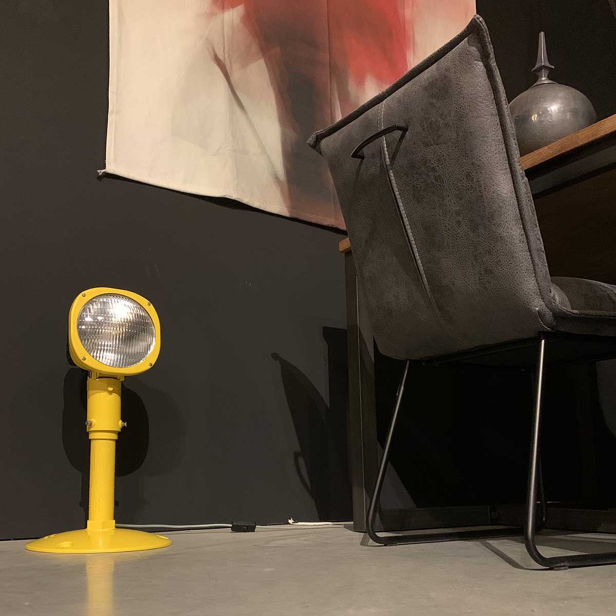 Secondhand Thorn runway approach light on a floor in a living room.