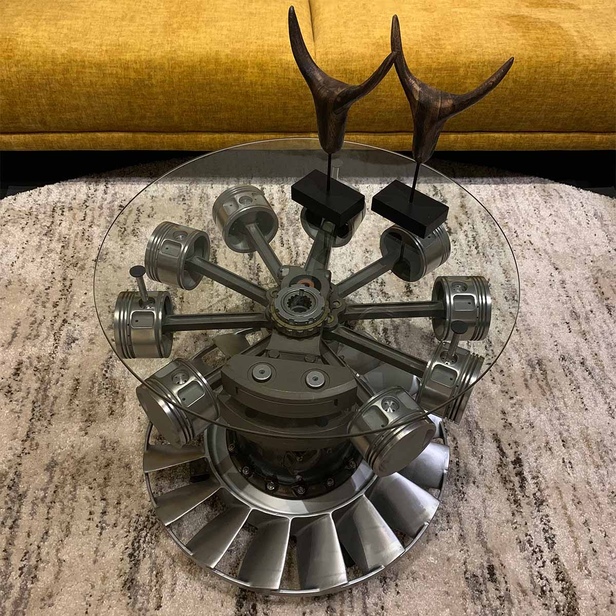 Kamov-26 helicopter engine turned into a table, positioned in a living room.