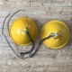 Two former Schiphol Airport runway lights for sale as ceiling lights.