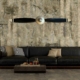 Two-bladed McCauley propeller with spinner in original colours, mounted on a wall in a modern living room.